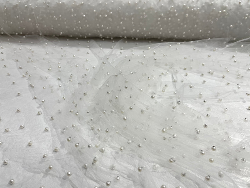 White Scattered Pearls Studded Mesh, 2-Way Stretch, sold by the yard.