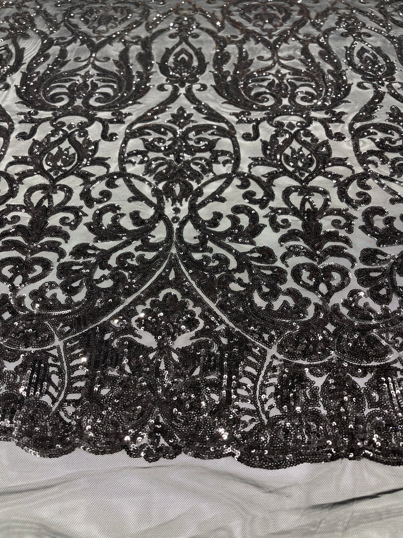 Black shiny sequin damask design on a black 4 way stretch mesh-prom- sold by the yard.