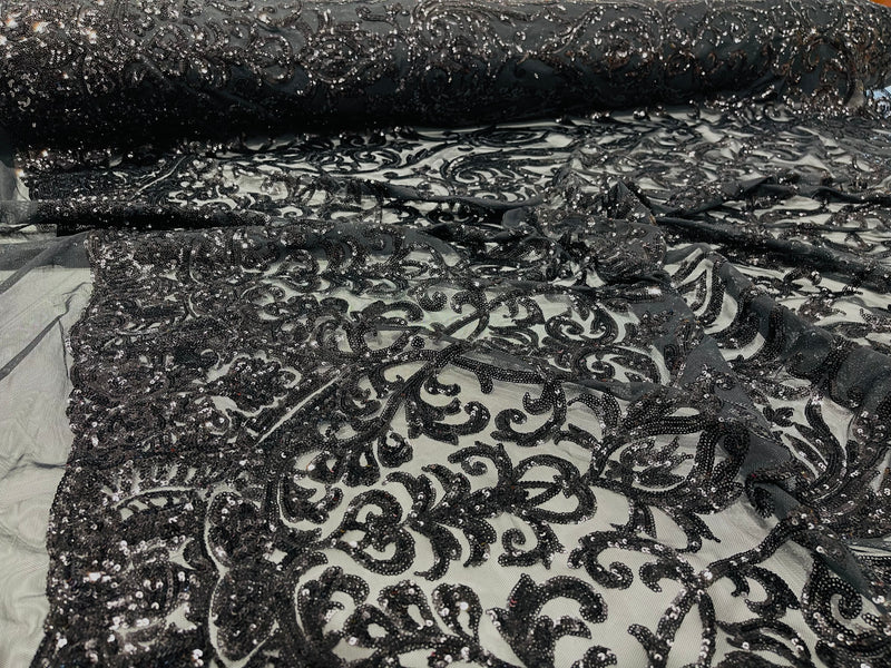 Black shiny sequin damask design on a black 4 way stretch mesh-prom- sold by the yard.