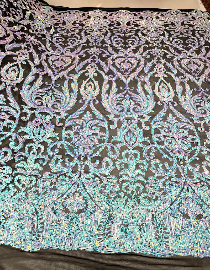 Aqua Blue iridescent shiny sequin damask design on a black 4 way stretch mesh- sold by the yard.