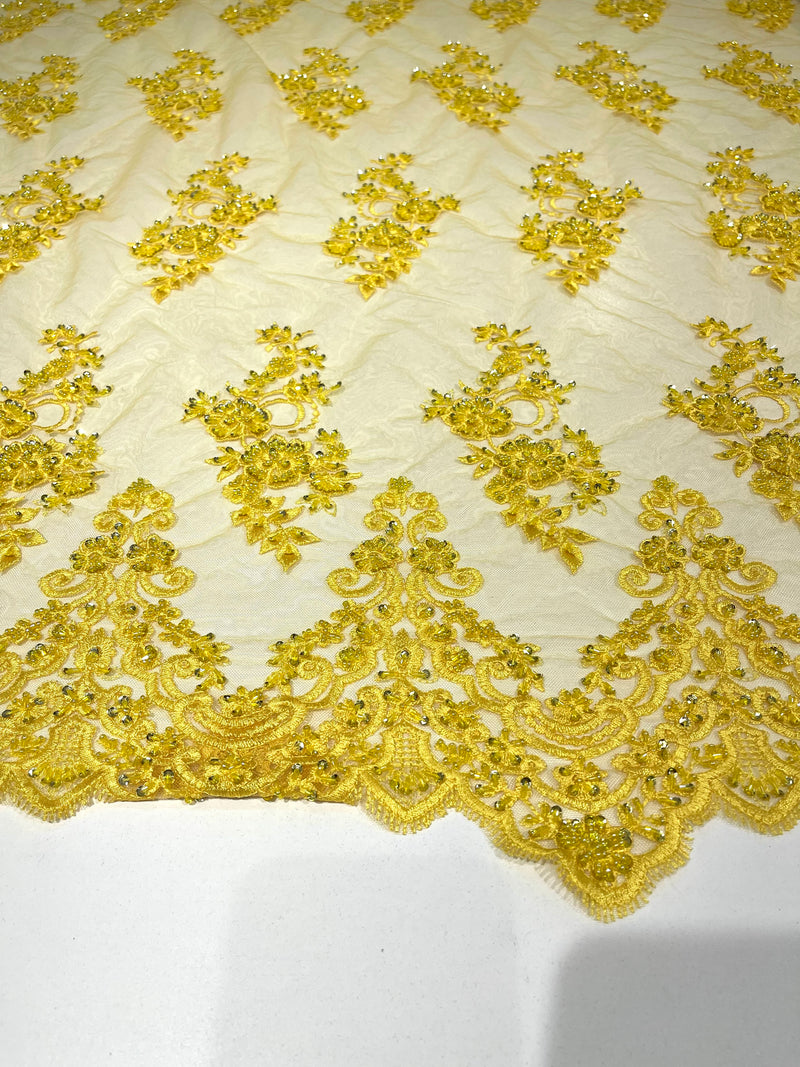Yellow elegant hand beaded flower design embroider on a mesh lace-prom-sold by the yard.