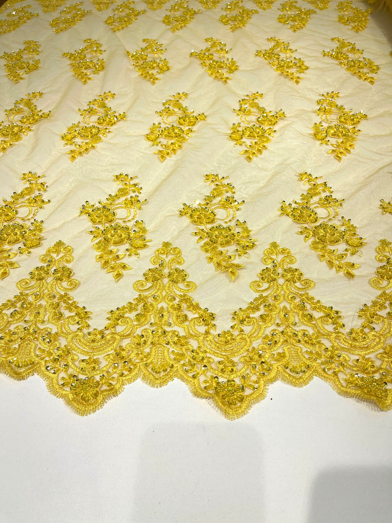 Yellow elegant hand beaded flower design embroider on a mesh lace-prom-sold by the yard.