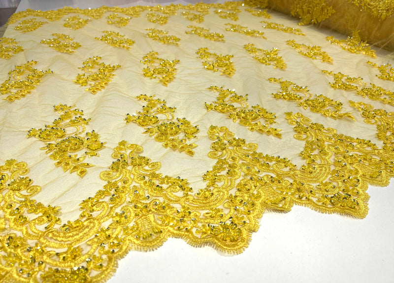 Yellow elegant hand beaded flower design embroider on a mesh lace-prom-sold by the yard.