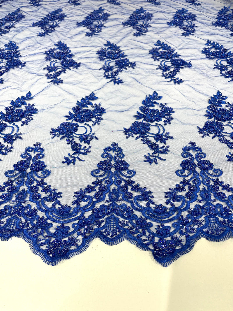 Royal Blue elegant hand beaded flower design embroider on a mesh lace-prom-sold by the yard.