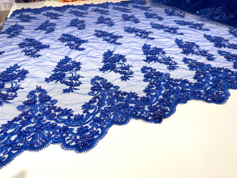 Royal Blue elegant hand beaded flower design embroider on a mesh lace-prom-sold by the yard.