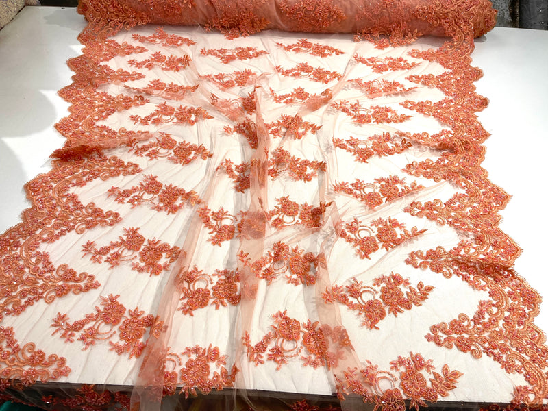 Coral elegant hand beaded flower design embroider on a mesh lace-prom-sold by the yard.
