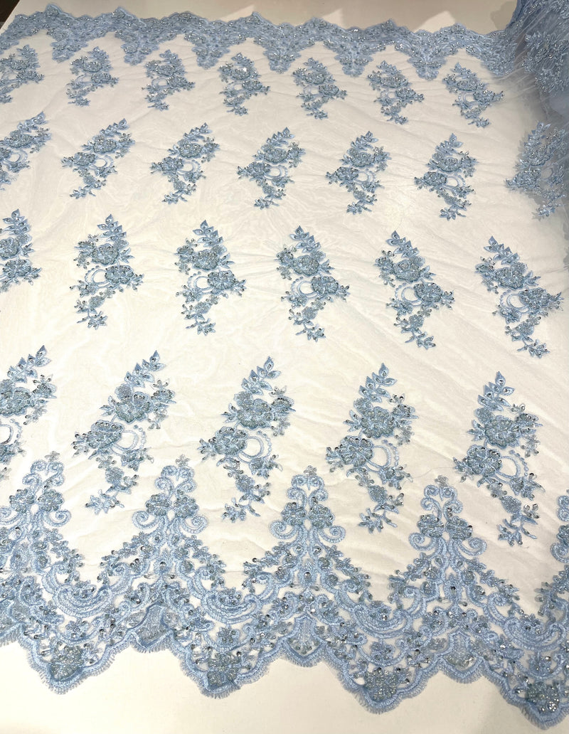Light Blue elegant hand beaded flower design embroider on a mesh lace-prom-sold by the yard.