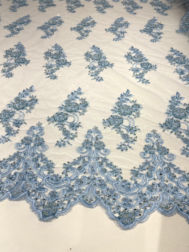Light Blue elegant hand beaded flower design embroider on a mesh lace-prom-sold by the yard.