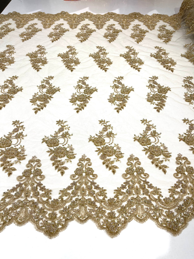 Metallic Gold elegant hand beaded flower design embroider on a mesh lace-prom-sold by the yard.