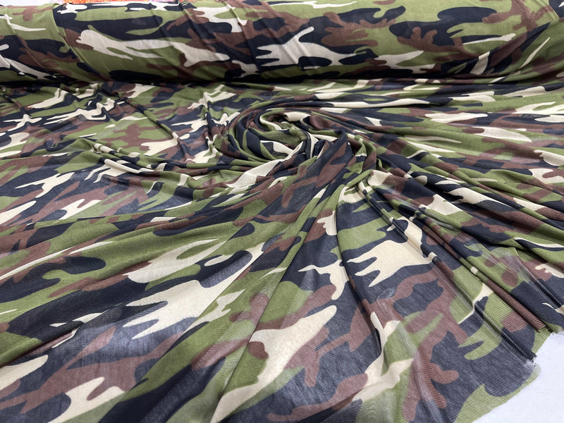 Green/ Tan/ Black Camouflage design on a Brown power mesh 4-way stretch 58"-Sold by the yard.