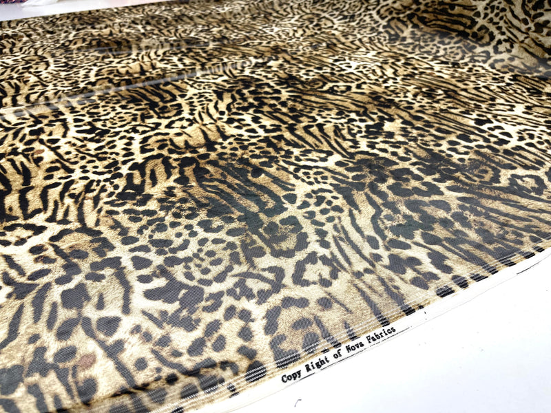 Tan/ Brown/ Black Leopard design on a power mesh 4-way stretch 58"-Sold by the yard.
