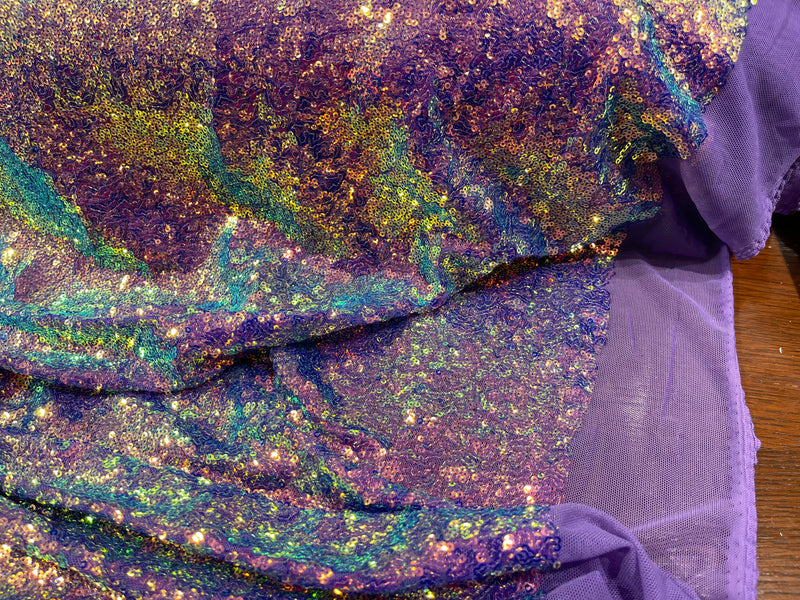 Lavender Iridescent Mini Glitz Sequins on a Purple 4 Way Stretch Mesh-Sold By The Yard.