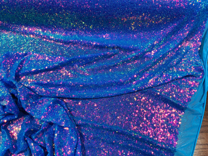 Purple Iridescent Mini Glitz Sequins on a Turquoise 4 Way Stretch Mesh-Sold By The Yard.