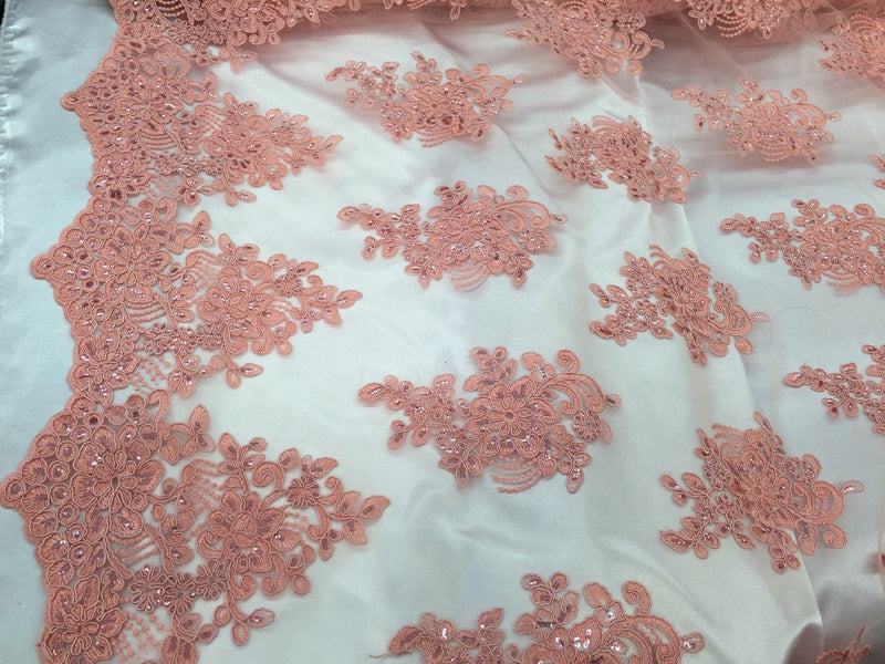 Coral flower lace corded and embroider with sequins on a mesh. Wedding/bridal/prom/nightgown fabric. Sold by the yard.