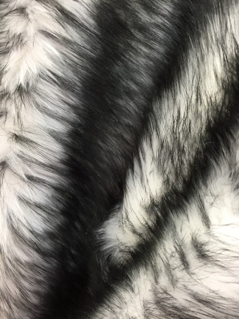 White/black husky faux fur, 2 tone shaggy faux fur. Sold by the yard.60" wide.