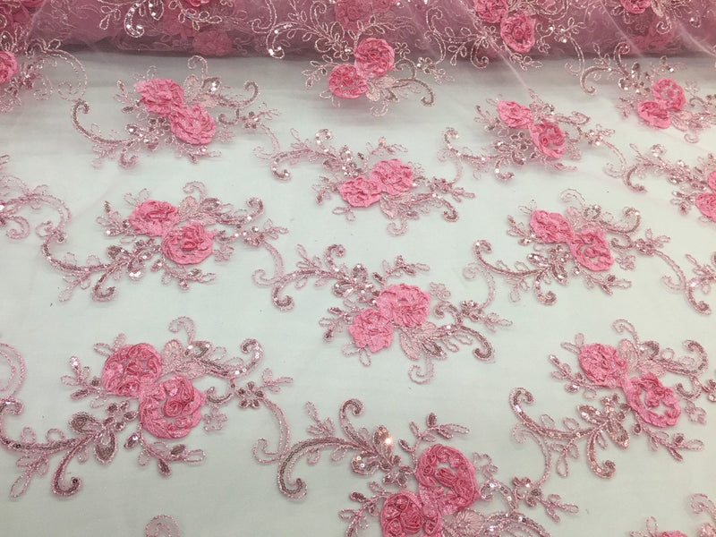 Pink 3d flowers embroider with sequins on a pink mesh lace. Wedding/bridal/prom/ nightgown fabric. Sold by the yard.