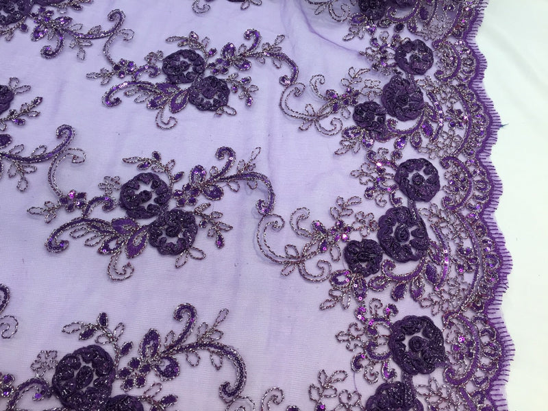 Purple 3d flowers embroider with sequins on a mesh lace fabric. Sold by the yard.