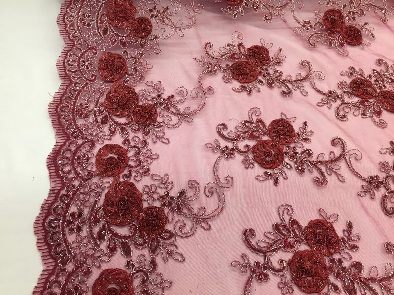 Burgundy 3d flowers embroider with sequins on a mesh lace fabric. Sold by the yard.