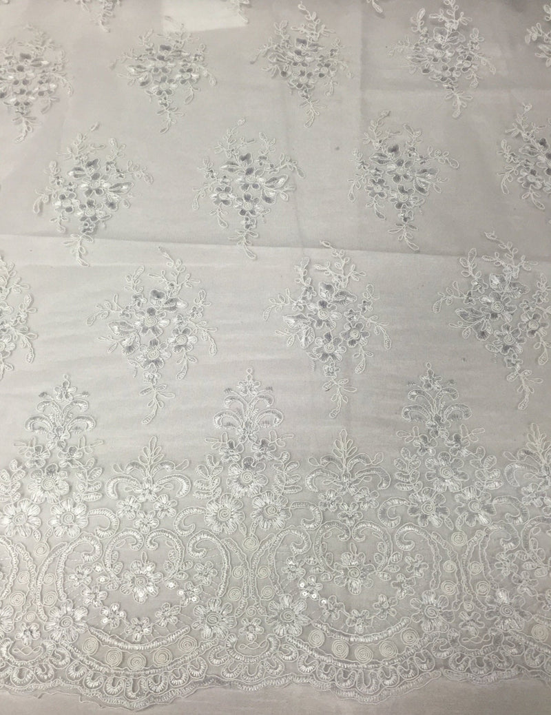 White Royal flowers design embroider with sequins and corded on a mesh lace-yard