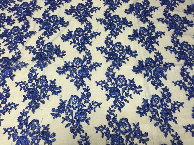 Royal blue modern roses embroider and corded on a mesh lace -yard