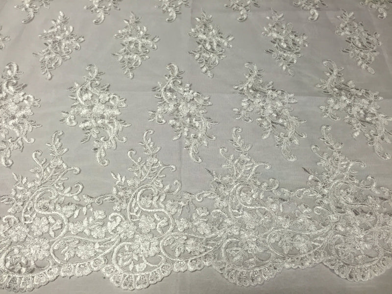 Off white classy paisley flowers embroider and corded on a mesh lace -yard