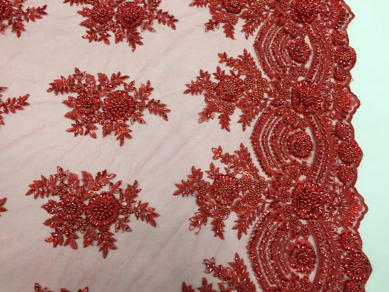 Red rich flower design embroider and heavy beading on a mesh lace-prom-nightgown-decorations-dresses-sold by the yard.