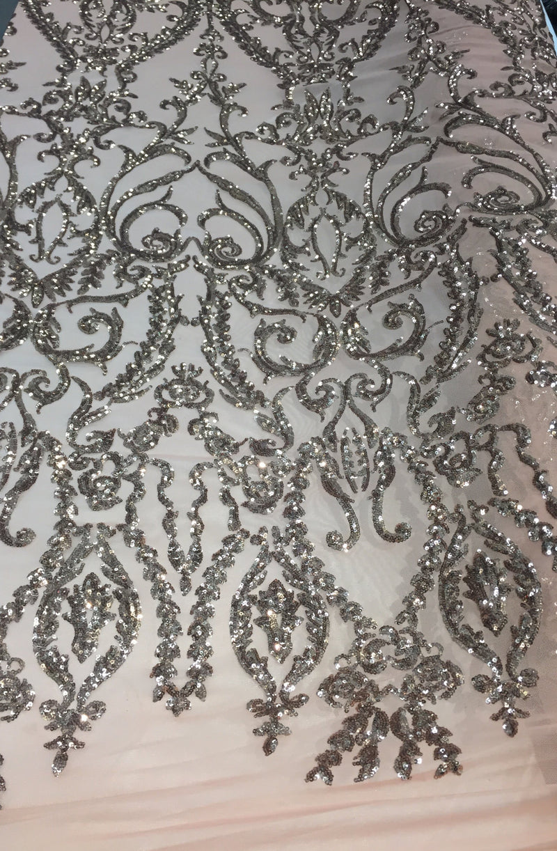 Skin damask design embroider with Sequins on a 4 way stretch mesh-sold by the yard.