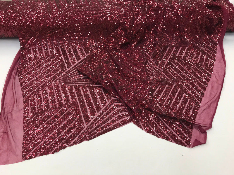 Geometric burgundy sequins embroider on a 4 way stretch mesh-Sold by the yard.