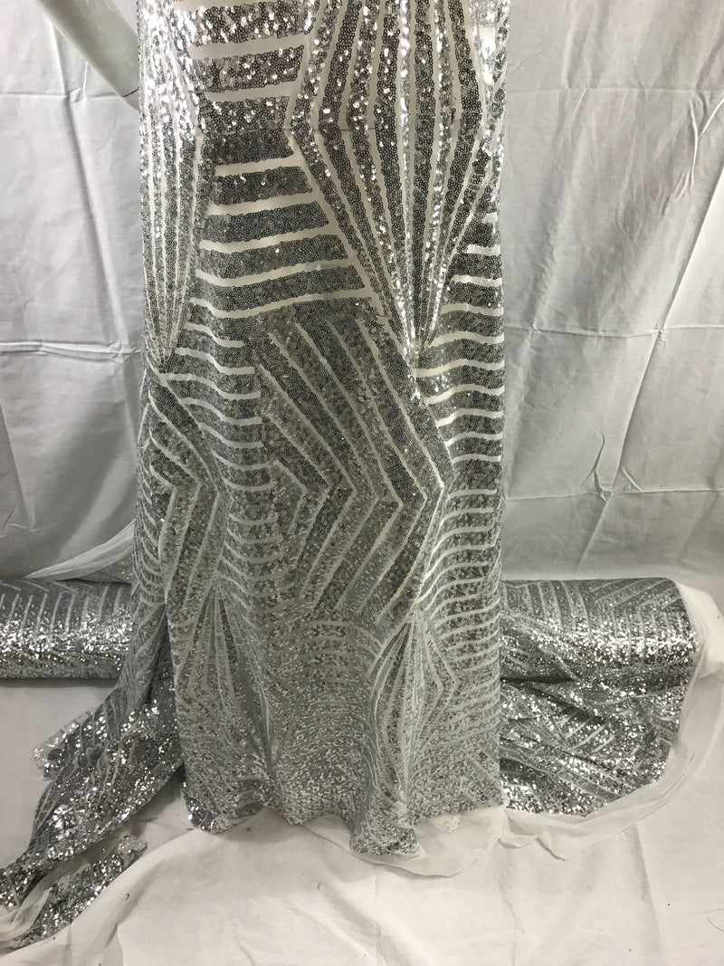 Geometric design embroider with silver sequins on a white mesh-fashion-decorations-nightgown-dresses-sold by the yard.