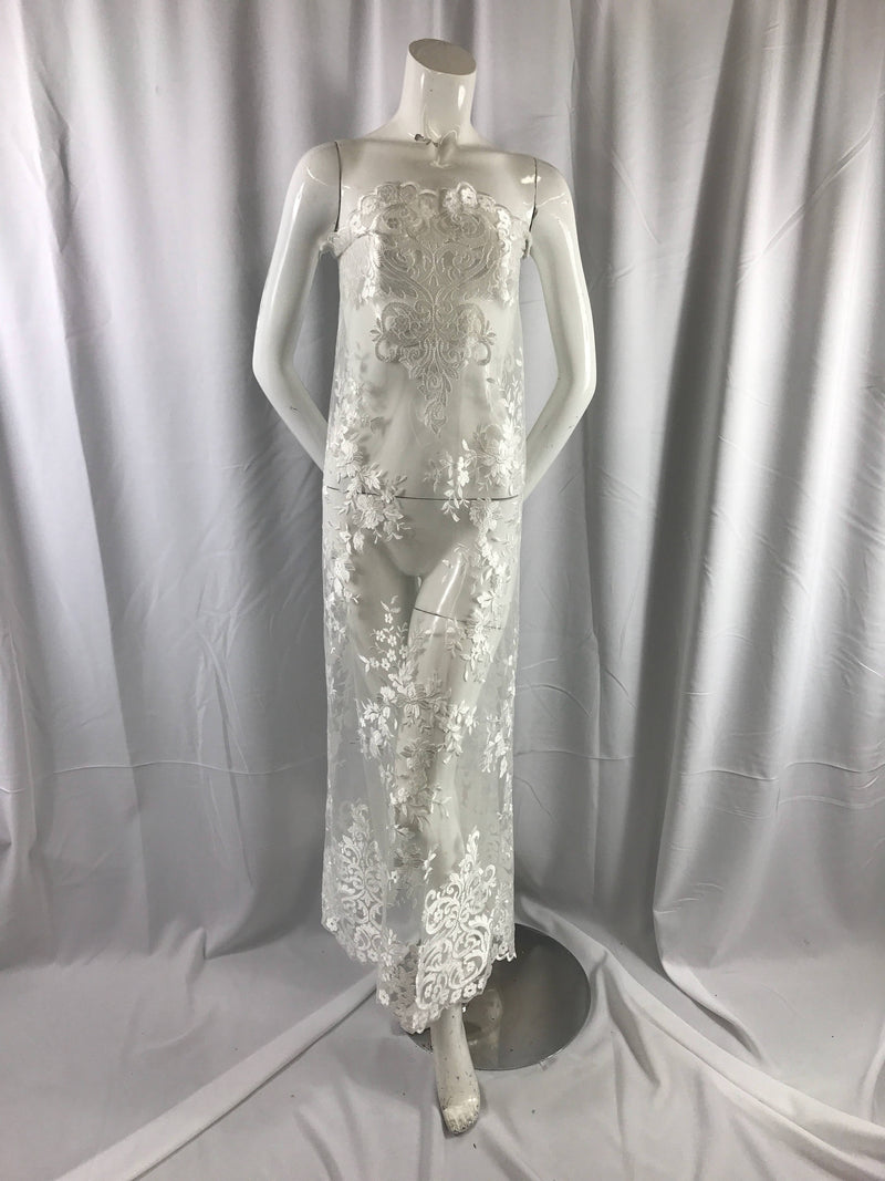 Ivory flowers embroider on a 2 way stretch mesh lace. Wedding/Bridal/Prom/Nightgown fabric-dresses-apparel-fashion-Sold by the yard.