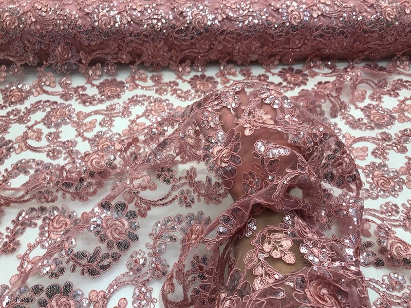 Dusty rose flowers embroider with sequins and corded on a mesh lace-wedding-bridal-prom-nightgown-decorations-sold by the yard.