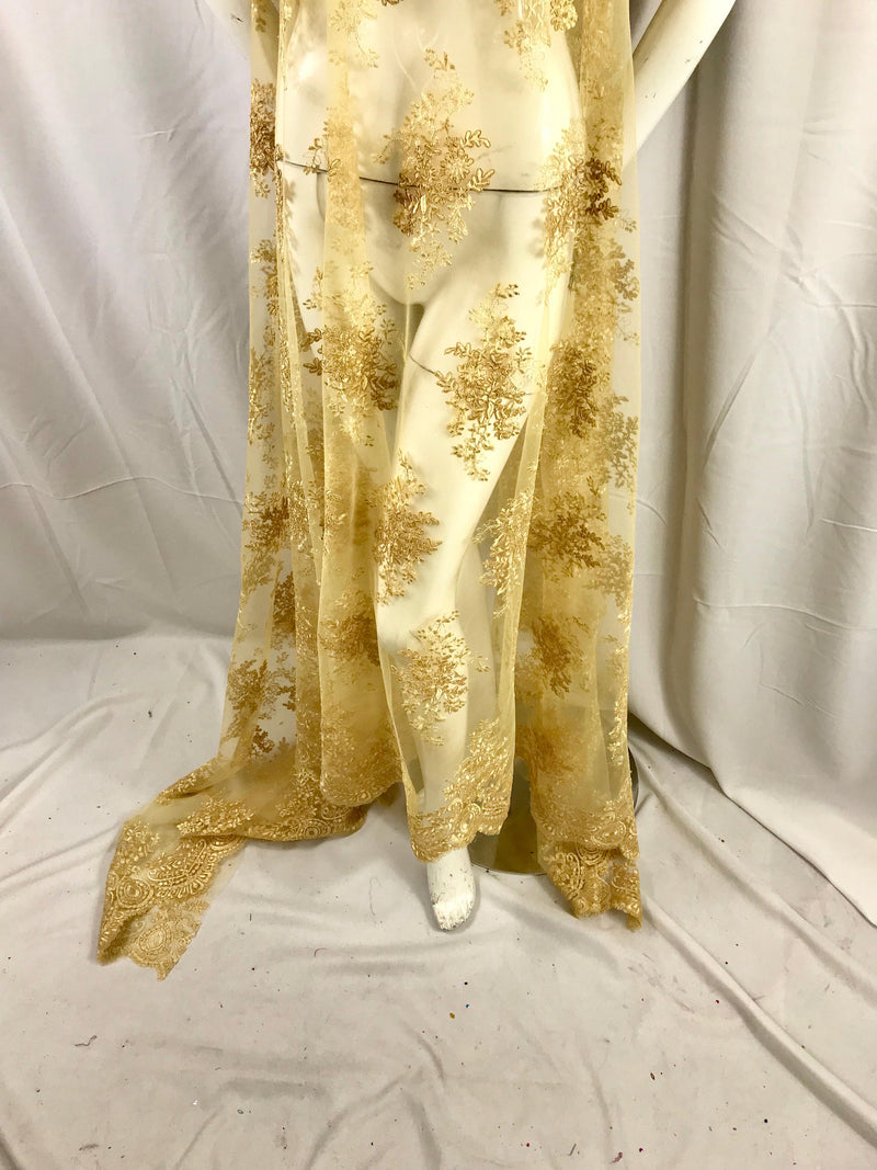 Gold flowers embroider on a mesh lace- wedding-bridal-prom-nightgown-dresses-apparel-fashion-decorations-sold by the yard.