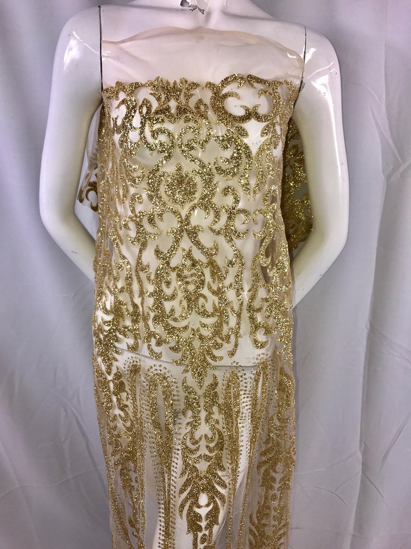 Gold shiny glitter damask design on a mesh lace-prom-decorations-apparel-fashion-nightgown-dresses-sold by the yard.