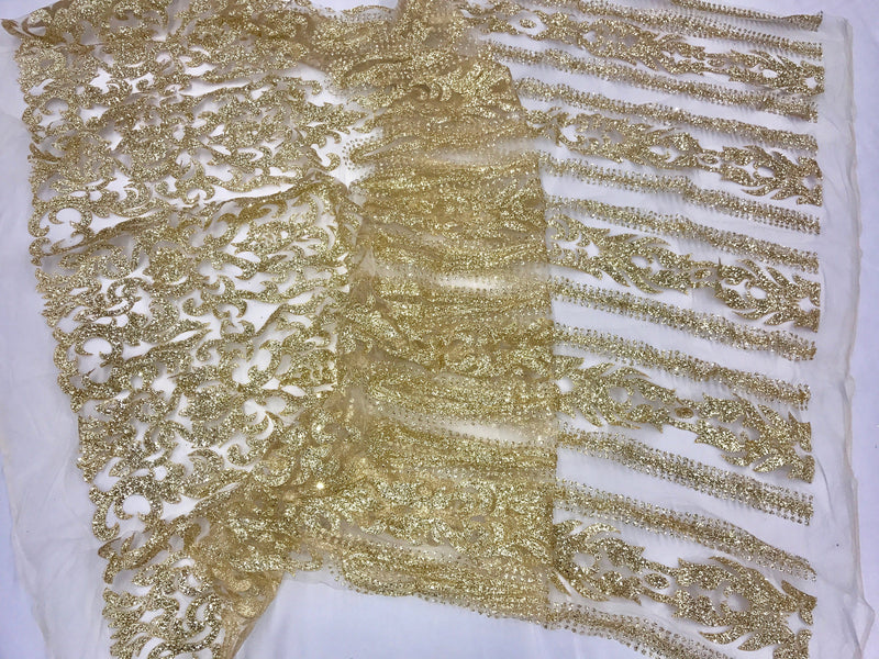 Gold shiny glitter damask design on a mesh lace-prom-decorations-apparel-fashion-nightgown-dresses-sold by the yard.