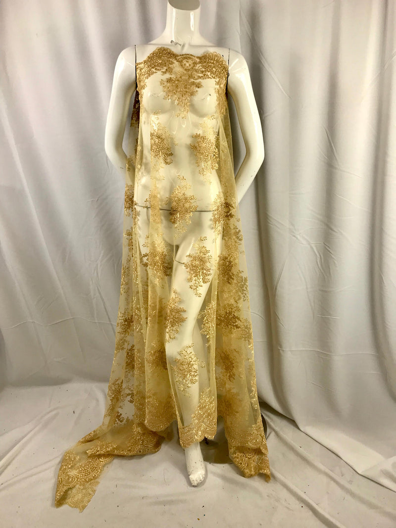 Gold flowers embroider on a mesh lace- wedding-bridal-prom-nightgown-dresses-apparel-fashion-decorations-sold by the yard.