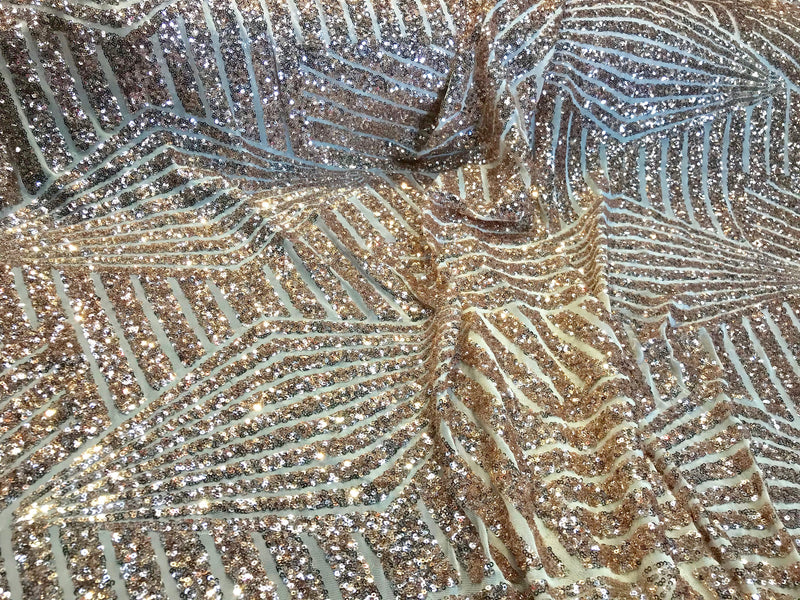 Rose gold geometric design embroider with sequin on a 4 way Stretch ivory power mesh-sold by yard.
