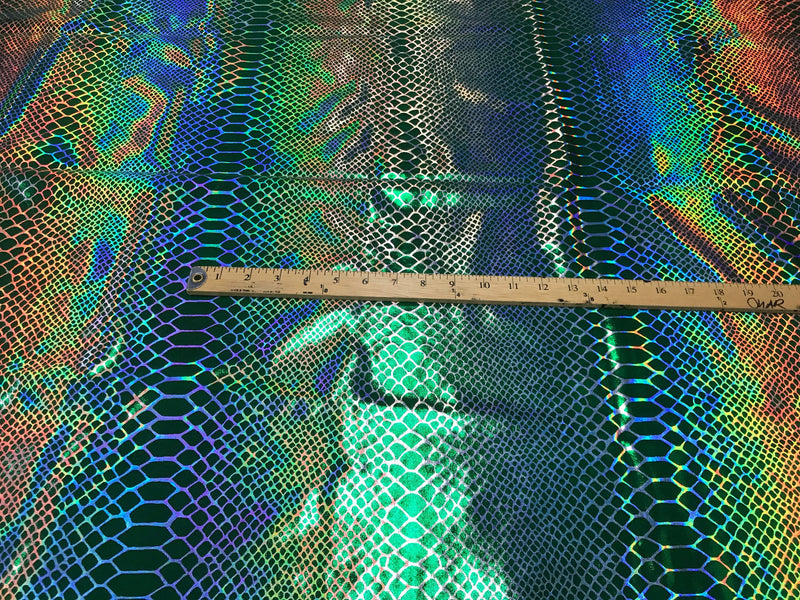 Green iridescent dragon scales print on a 2 way stretch nylon spandex-dresses-lwggings-decorations-prom-nightgown-sold by the yard.