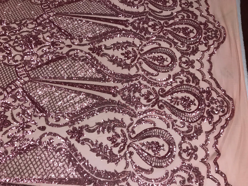 Dusty rose princess design embroider with shiny sequins on a 4 way stretch mesh-sold by the yard.
