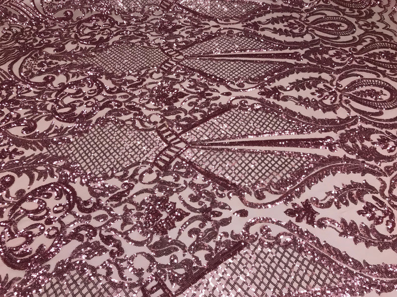 Dusty rose princess design embroider with shiny sequins on a 4 way stretch mesh-sold by the yard.