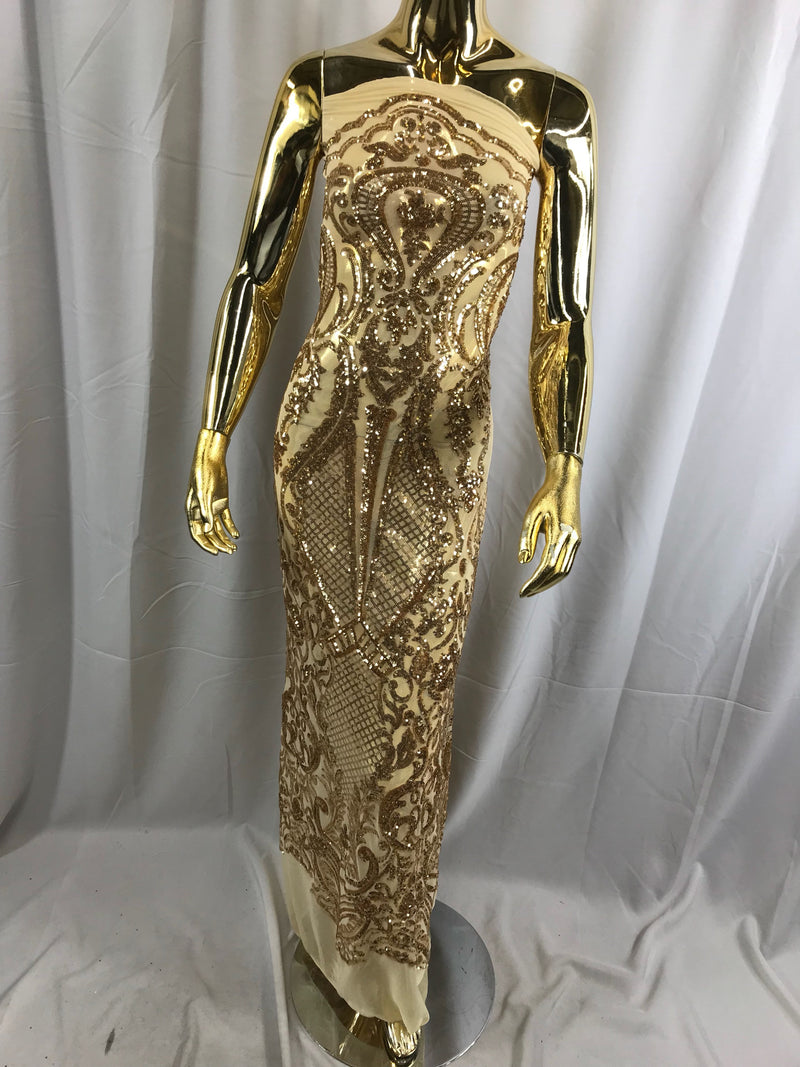 Gold princess design embroider with shiny sequins on 4 way stretch a power mesh-sold by the yard.