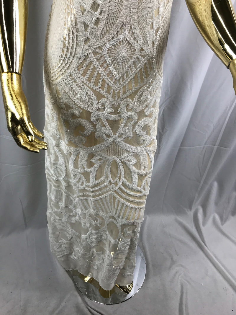 White royalty design embroider with shiny sequins on a 4 way stretch mesh-sold by the yard.