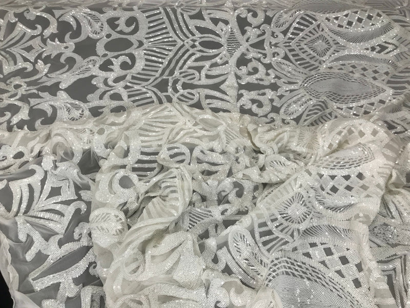 White royalty design embroider with shiny sequins on a 4 way stretch mesh-sold by the yard.