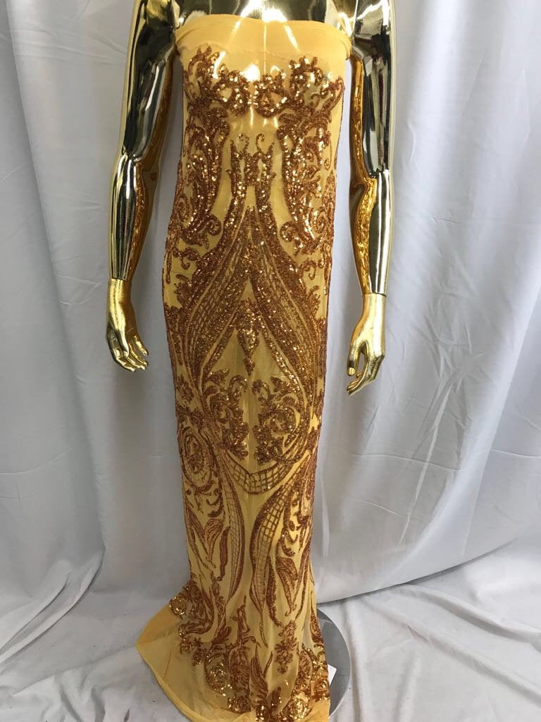 Gold empire design embroider with shiny sequins on a 4 wY stretch power mesh-dresses-fashion-apparel-prom-nightgown-sold by yard.