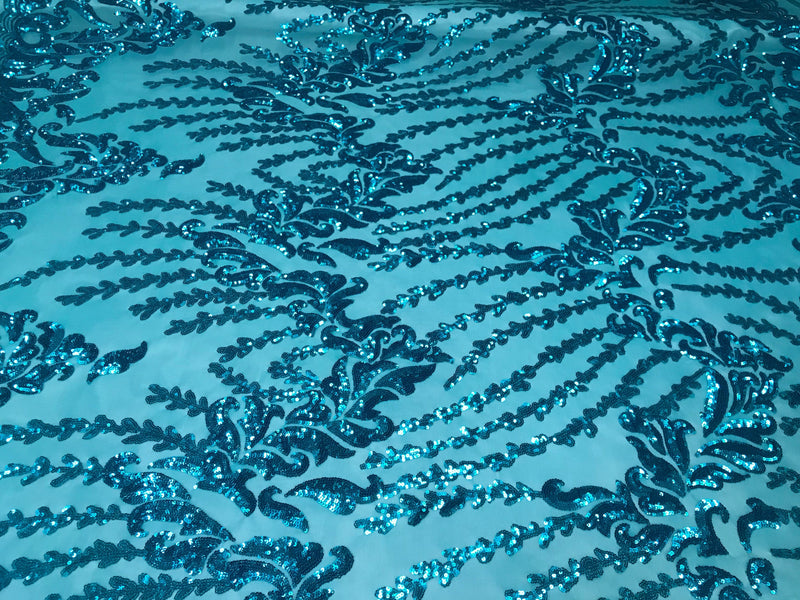 Turquoise 4 way Stretch power mesh lace embroidered with shiny sequins-sold by the yard.