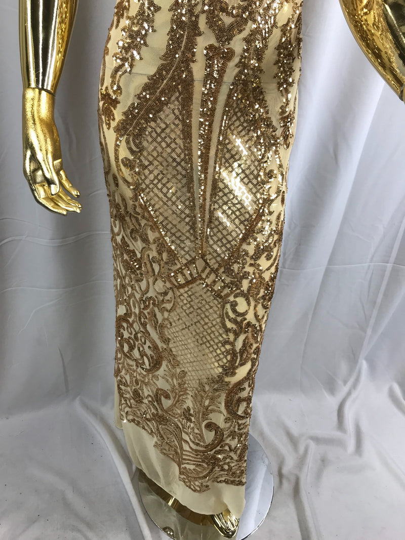 Gold princess design embroider with shiny sequins on 4 way stretch a power mesh-sold by the yard.