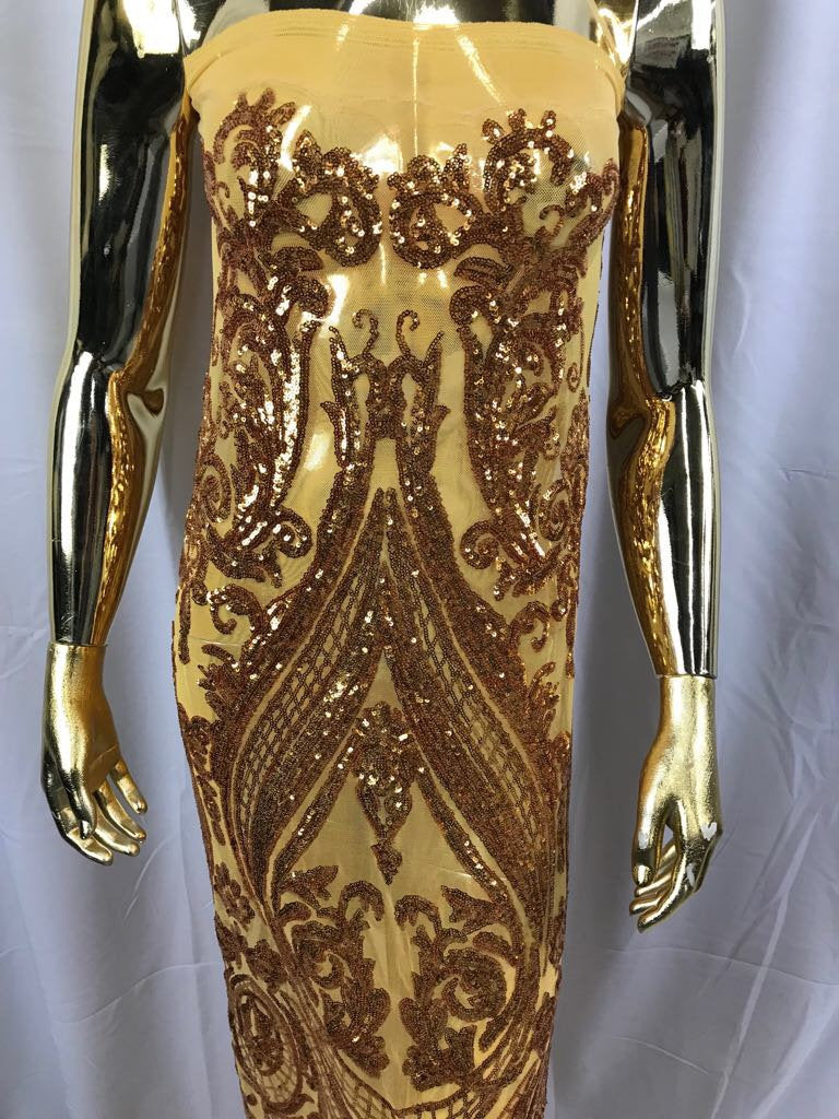 Gold empire design embroider with shiny sequins on a 4 wY stretch power mesh-dresses-fashion-apparel-prom-nightgown-sold by yard.