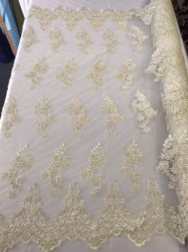 Dark ivory hand beaded floral design embroidery with shiny sequins on a mesh lace-dresses-apparel-fashion-prom-nightgown-sold by the yard.