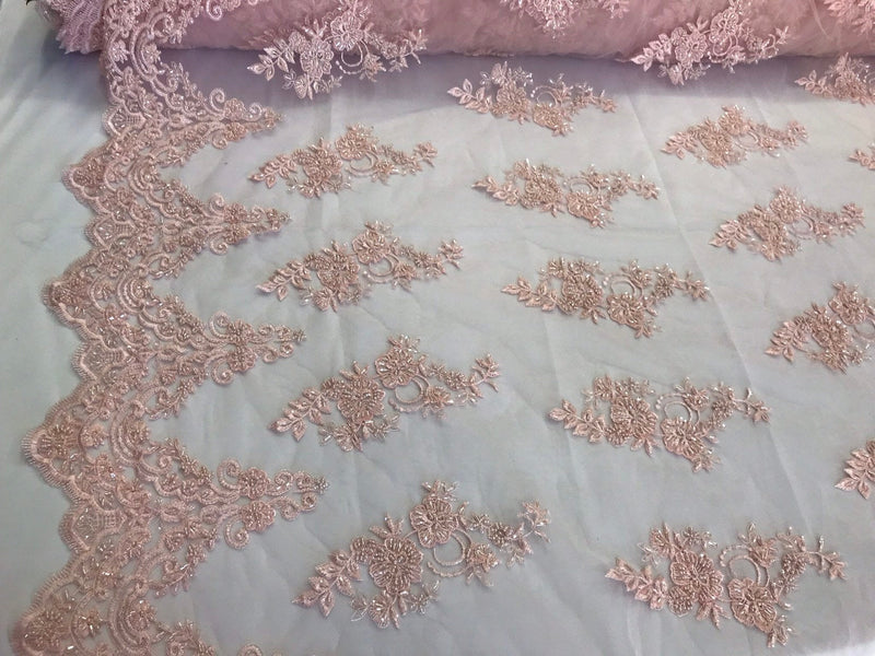 Light pink hand beaded floral design embroidery with shiny sequins on a mesh lace-dresses-apparel-fashion-prom-nightgown-sold by the yard.