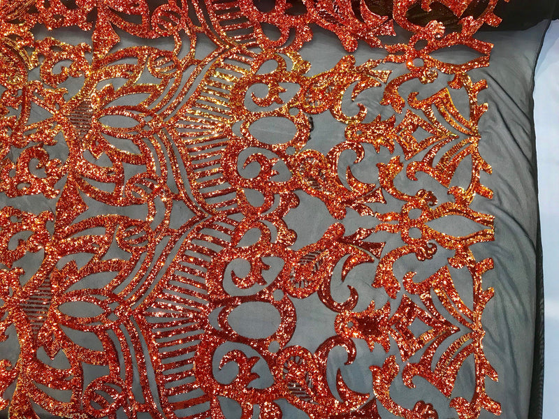 Orange royalty iridescent sequins on a 4 way Stretch black mesh-sold by the yard.