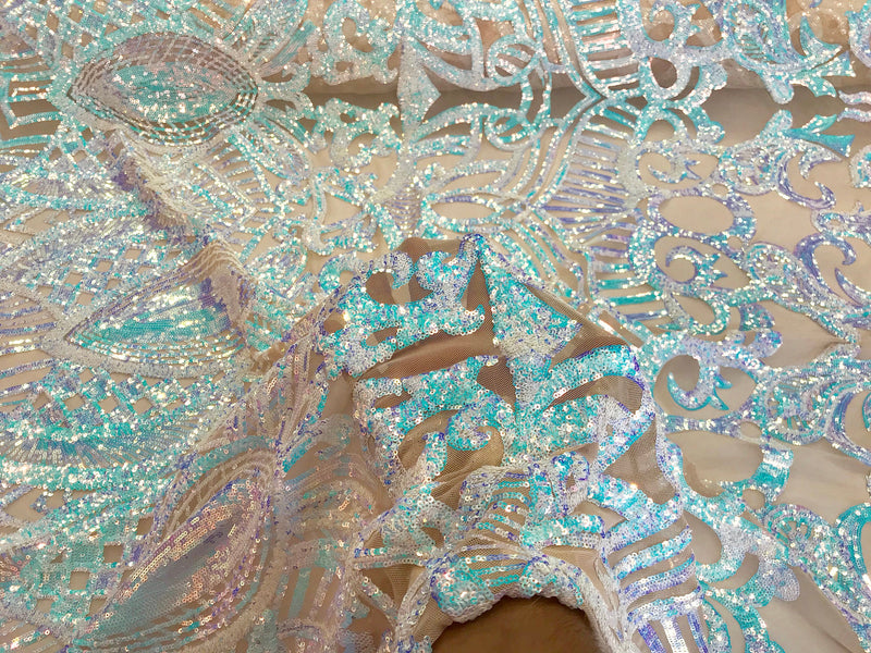 Aqua royalty iridescent sequins on a 4 way stretch nude mesh lace-dresses-apparel-fashion-prom-nightgown-sold by the yard.
